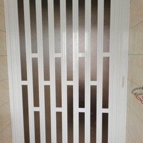 供應 電動工業(yè)折疊門 pvc折疊門 廠家直銷